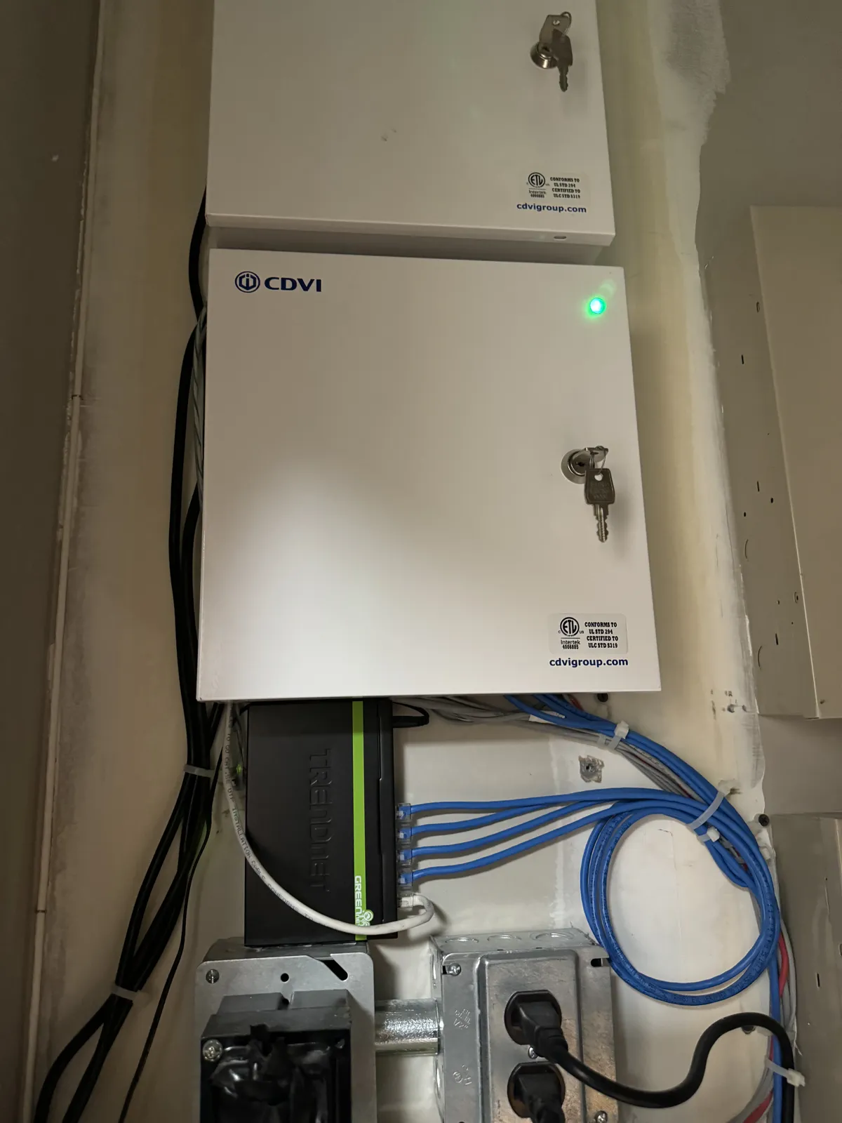 Wall-mounted network and access control cabinet